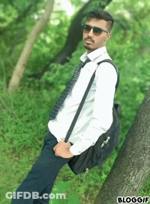 Man With Sunglasses Tie Against Tree Backpack GIF