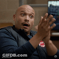 Man With Surprised Look Clapping GIF