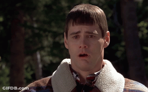 Man With Surprised Look In Plaid Jacket GIF