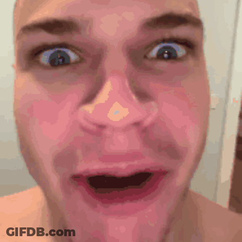 Man With Surprised Open Mouth GIF