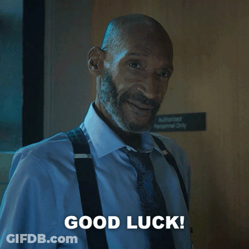 Man With Suspenders And Beard Saying Good Luck GIF