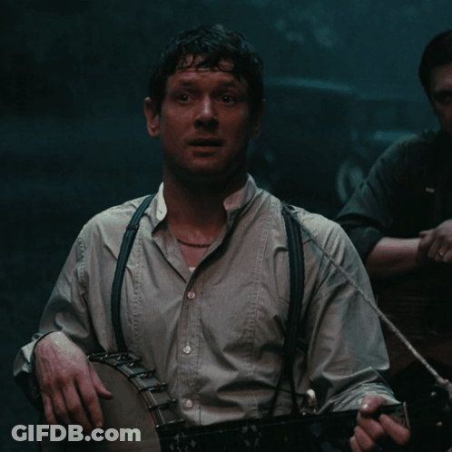 Man With Suspenders And Ring Smiling GIF