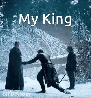 Man With Sword In Snow, Another Man Watches GIF