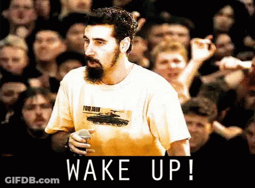 Man With Tank Shirt Saying Wake Up GIF