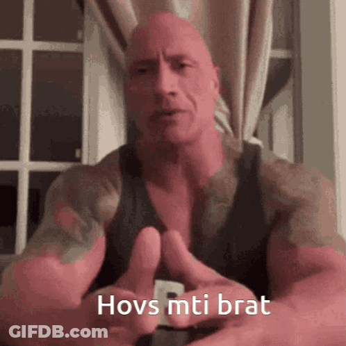Man With Tattoo Giving Thumbs Up Says Hovs Mti Brat GIF
