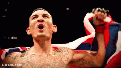Man With Tattoo Holding Flag GIF