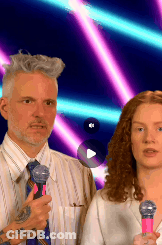 Man With Tattoo Holding Pink Microphone GIF