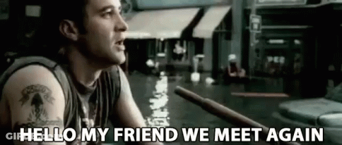 Man With Tattoo Holding Stick In Flooded Street GIF