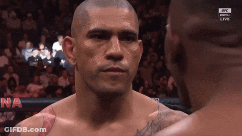 Man With Tattoo Looking At Another Man GIF