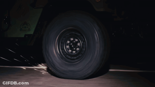 Man With Tattoo On Arm In Black Mask GIF