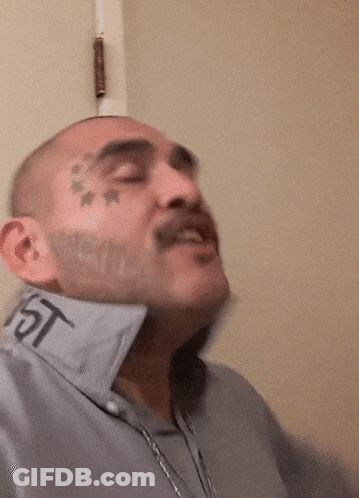 Man With Tattoo On Face Has Word Jeeee GIF