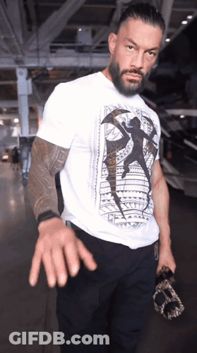 Man With Tattoo Saying A GIF
