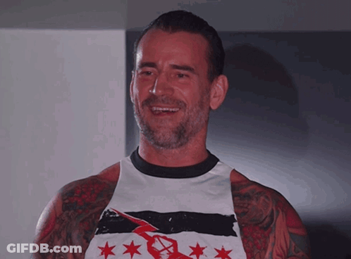 Man With Tattoo Wearing CT Shirt GIF