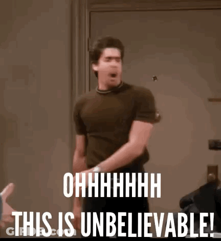 Man With This Is Unbelievable On Face Standing Before Door GIF