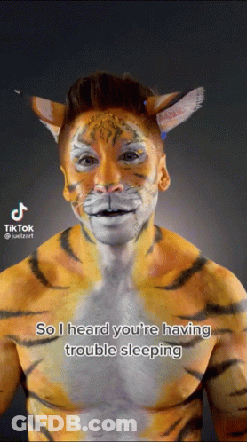 Man With Tiger Face Paint GIF