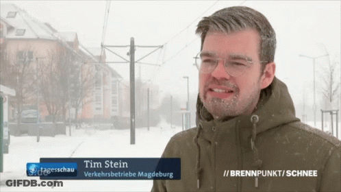 Man With Tim Stein On Jacket GIF