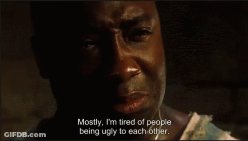 Man With Tired Expression And Words Mostly I'm Tired GIF