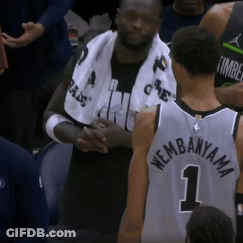 Man With Towel And Number 1 Jersey GIF