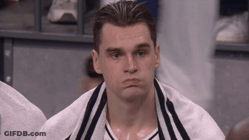 Man With Towel Around Neck Looks Tired GIF