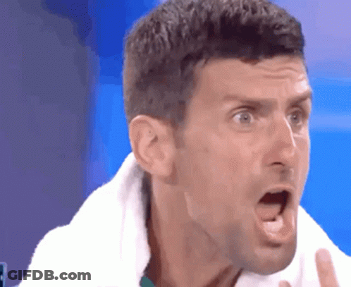 Man With Towel Around Neck Making Funny Face GIF