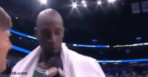 Man With Towel At Microphone In Boxing Ring GIF