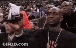 Man With Towel At Microphone In Boxing Ring GIF