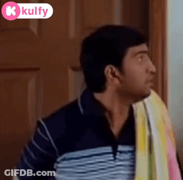 Man With Towel Making Funny Face At Door GIF