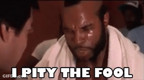 Man With Towel Says I Pity The Fool To Another Man GIF