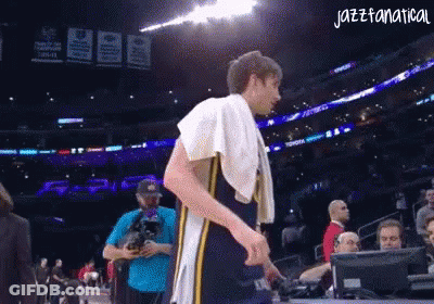 Man With Towel Walking On Basketball Court Saying Jazzfanatical GIF