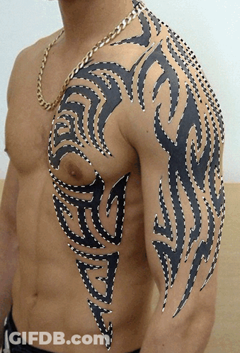 Man With Tribal Chest Tattoo GIF