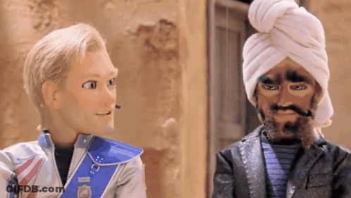 Man With Turban Talking To Man GIF