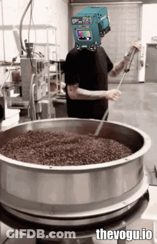 Man With TV Head Stirring In Metal Bowl GIF