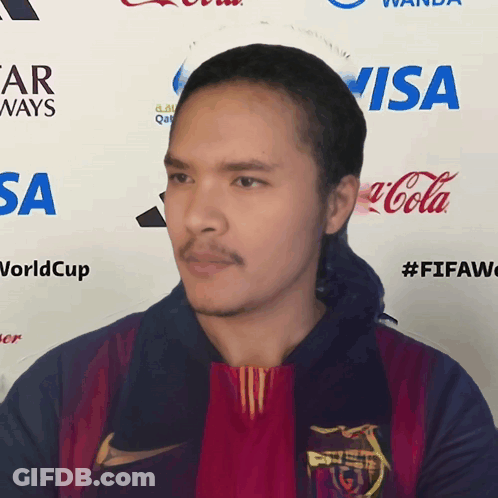 Man With Visa Coca Cola Qatar Airways Logos GIF