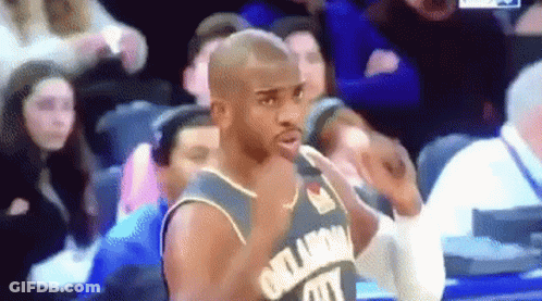 Man With W On Head Holding Flag GIF