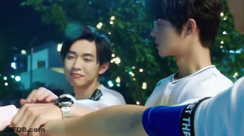 Man With Watch And Blue Wristband Saying Let The GIF