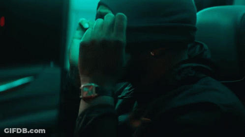 Man With Watch Covering Face GIF