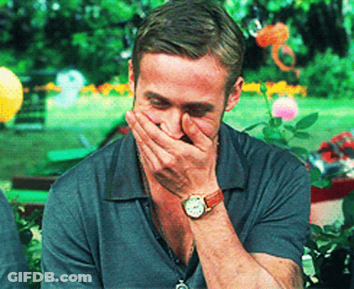 Man With Watch Covering His Mouth GIF