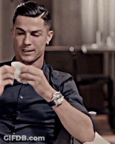 Man With Watch Holding Paper GIF