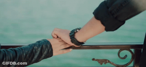 Man With Watch Holding Woman's Hand GIF