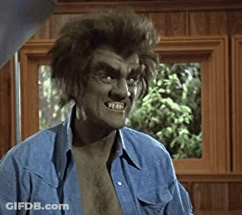 Man With Werewolf Makeup And Blue Shirt GIF