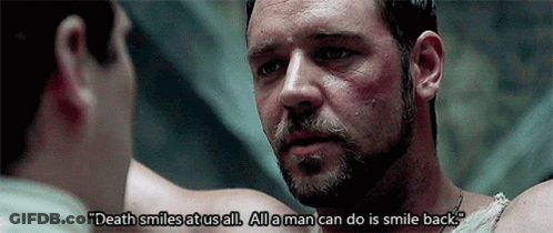 Man With What We Do In Life Written On Face GIF