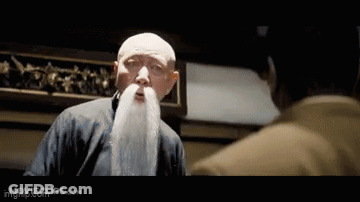 Man With White Beard Talking To Another Man GIF