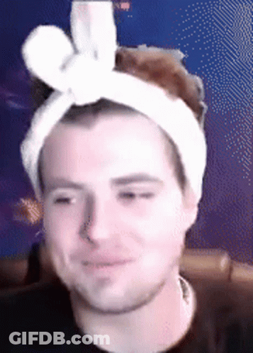 Man With White Bow Headband GIF