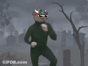 Man With White Cat On Head In Cemetery GIF