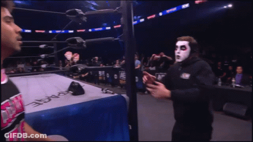 Man With White Face And Red Eyes GIF