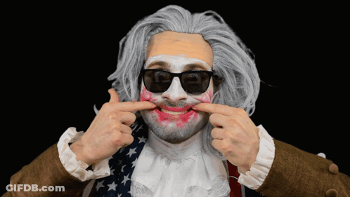 Man With White Face Paint And Sunglasses Making Funny Face GIF
