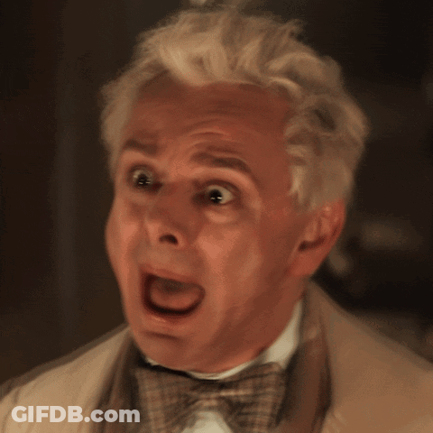Man With White Hair And Bow Tie Making Funny Face GIF