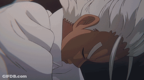 Man With White Hair Laying Down GIF