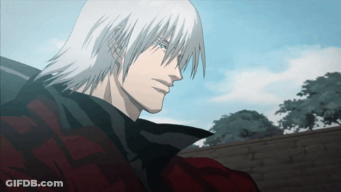 Man With White Hair Reading Foreign Language Book GIF