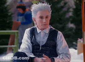 Man With White Hair Sitting On Bench GIF